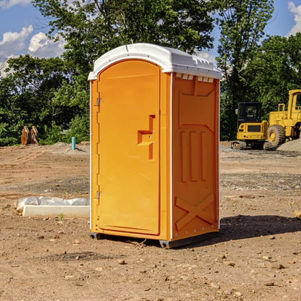 how often are the portable toilets cleaned and serviced during a rental period in Nicollet County